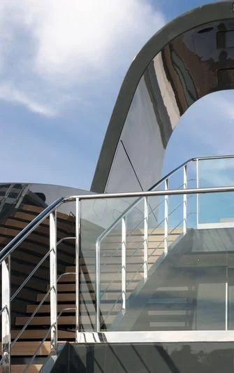 a staircase leading to a building aboard OCEAN SAPPHIRE Yacht for Sale