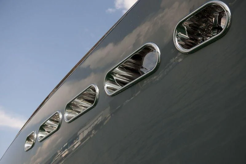 a side view mirror on a car aboard OCEAN SAPPHIRE Yacht for Sale