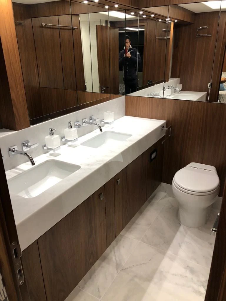 a bathroom with a sink and a toilet aboard BLACK MAMBA Yacht for Charter