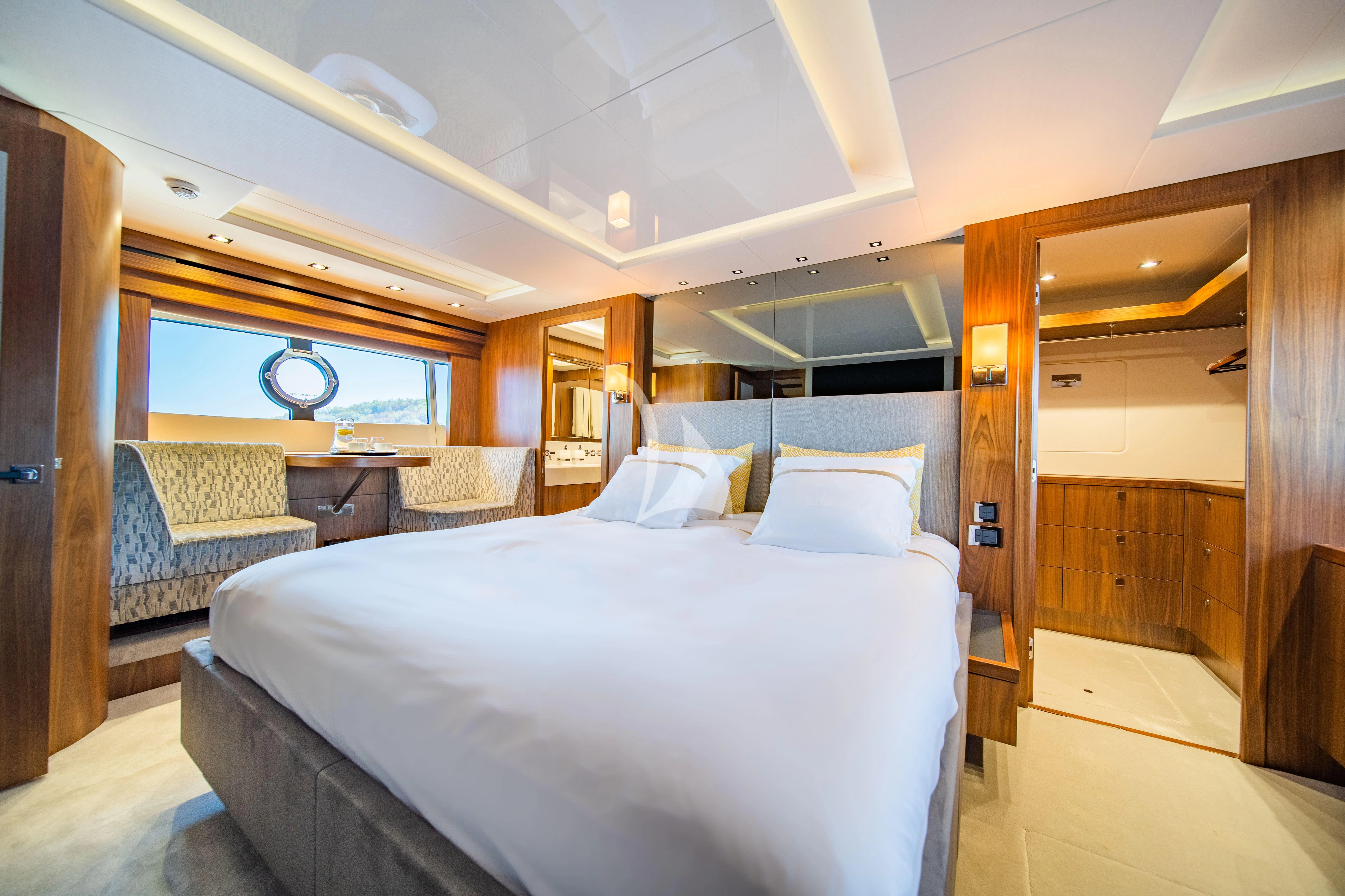 a large bed in a room aboard BLACK MAMBA Yacht for Charter