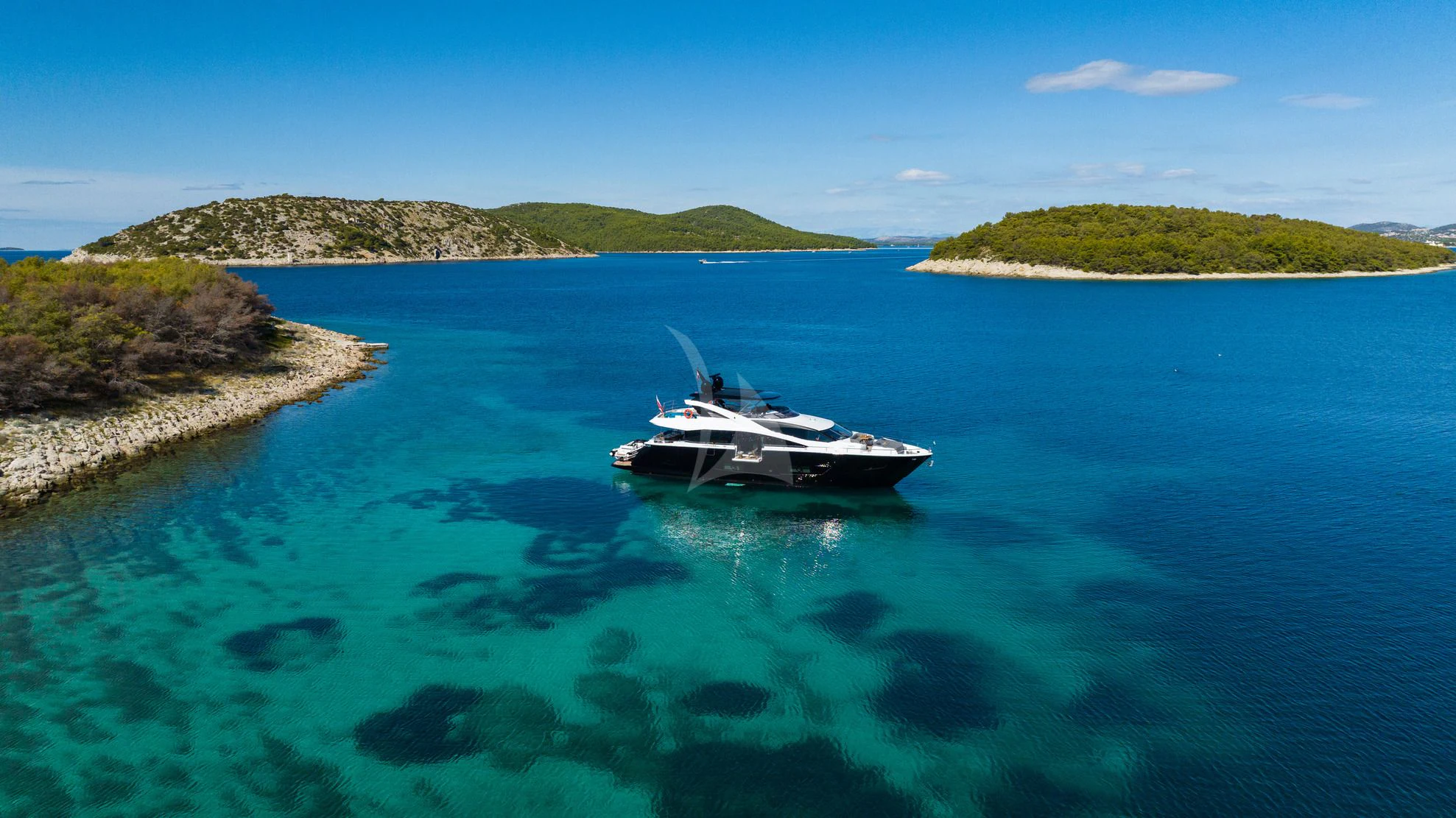 a boat in the water aboard BLACK MAMBA Yacht for Charter