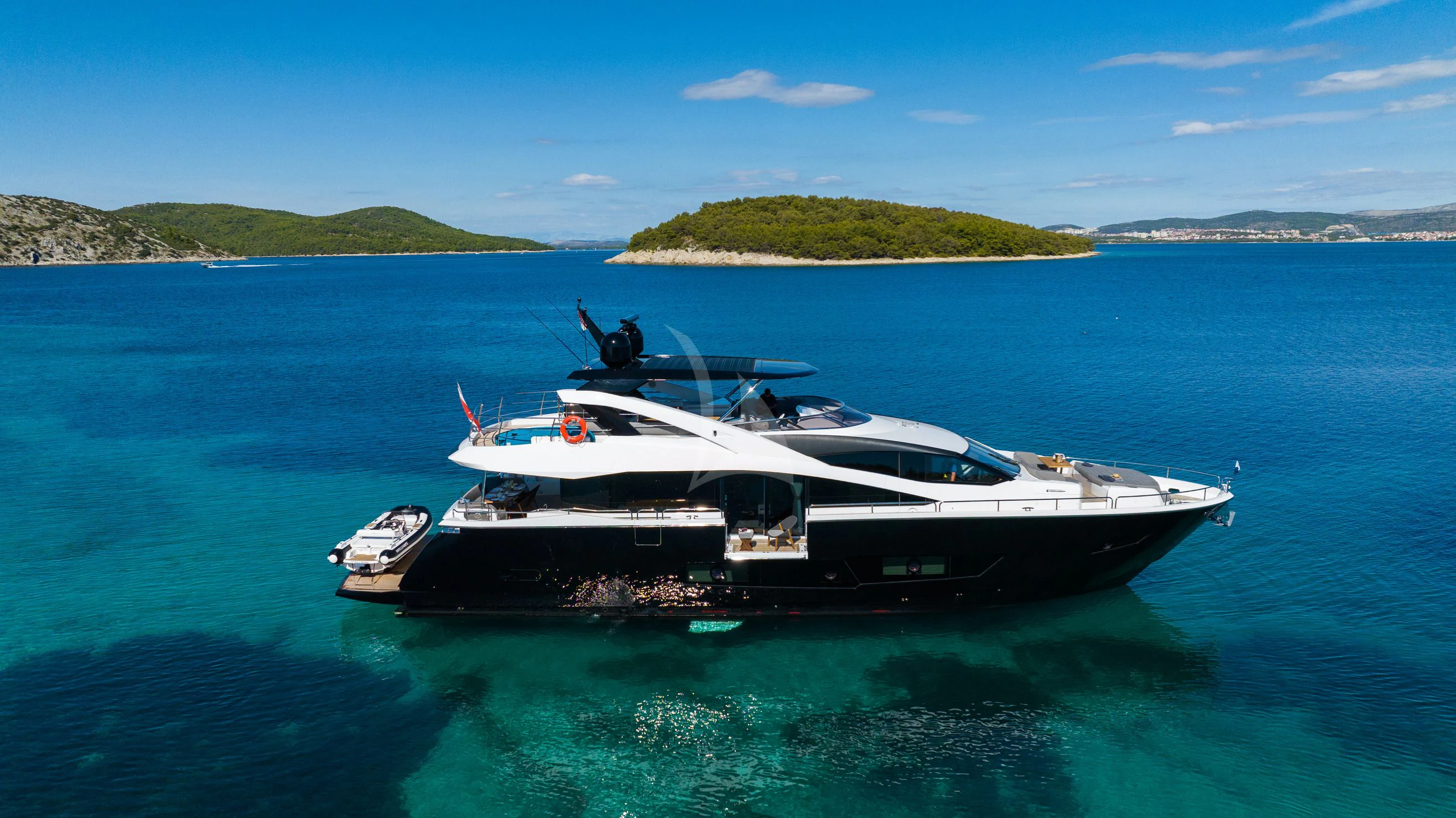 a boat in the water aboard BLACK MAMBA Yacht for Charter