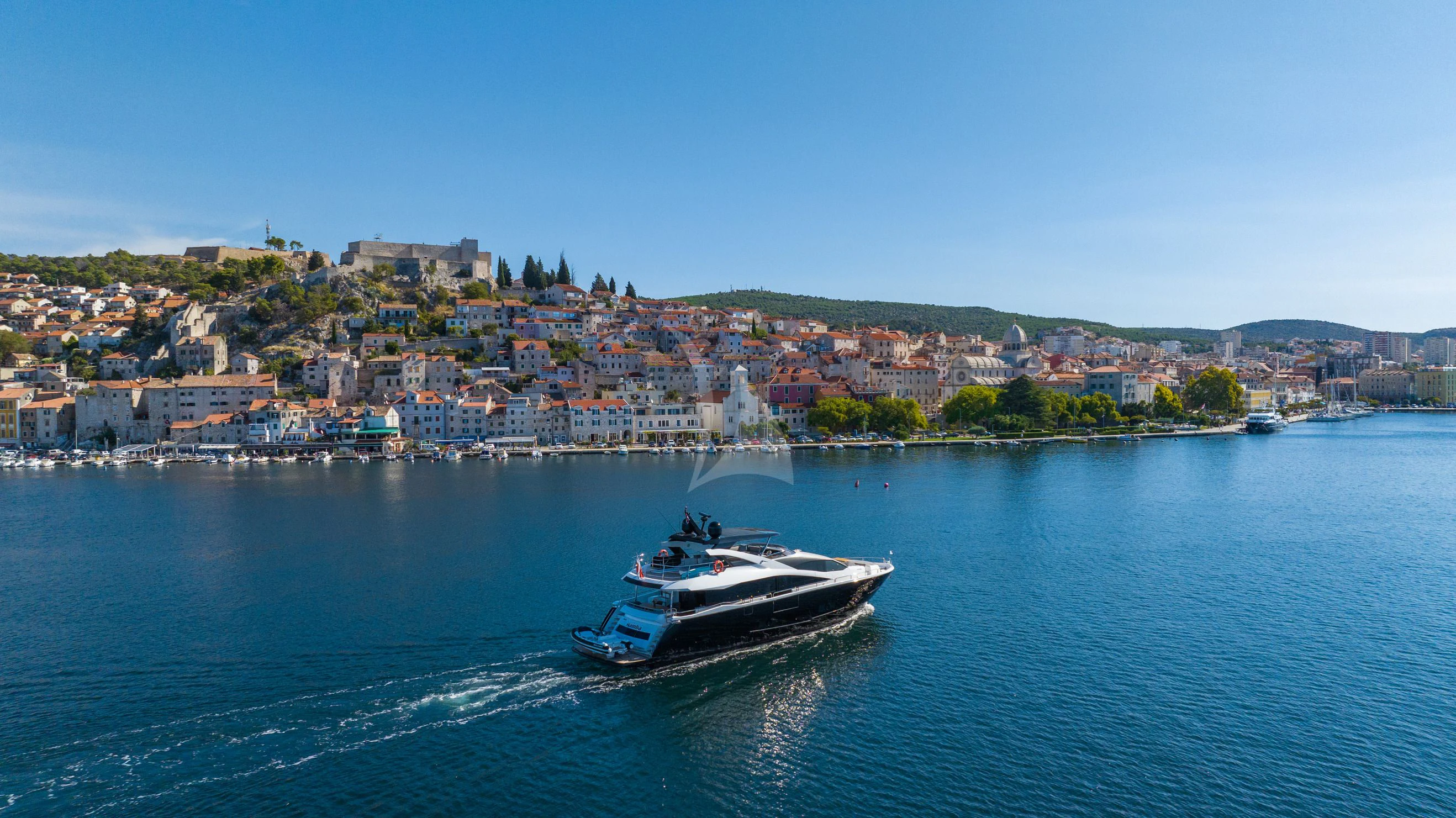 a boat on the water aboard BLACK MAMBA Yacht for Charter