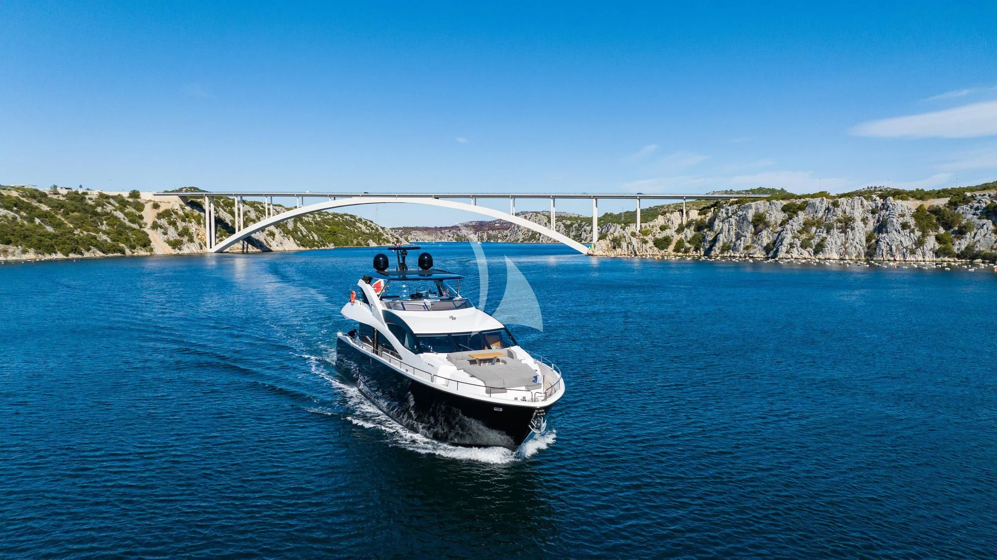 a boat sailing on the water aboard BLACK MAMBA Yacht for Charter