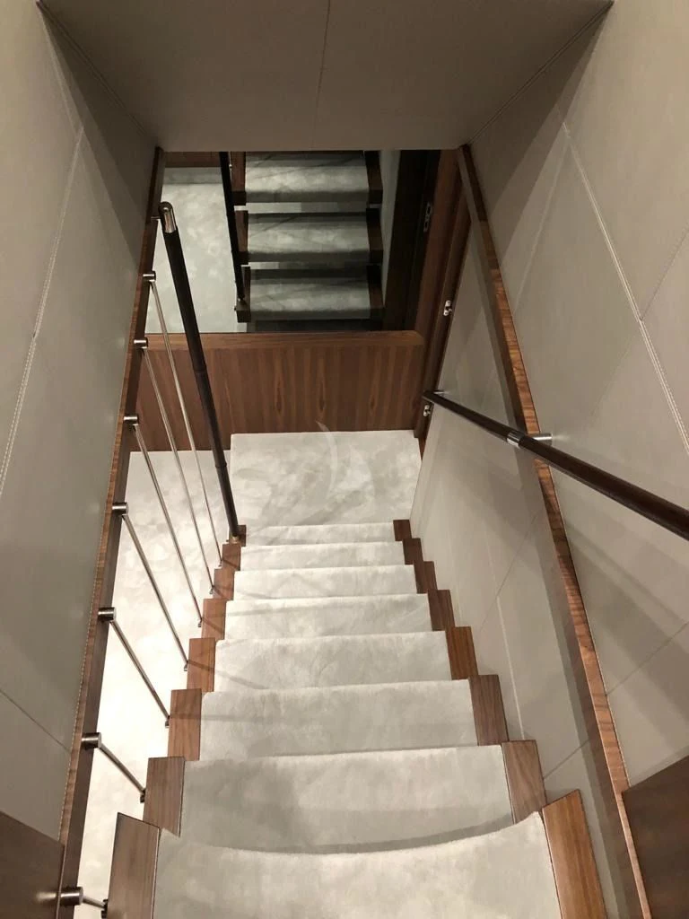 a set of stairs leading up to a building aboard BLACK MAMBA Yacht for Charter