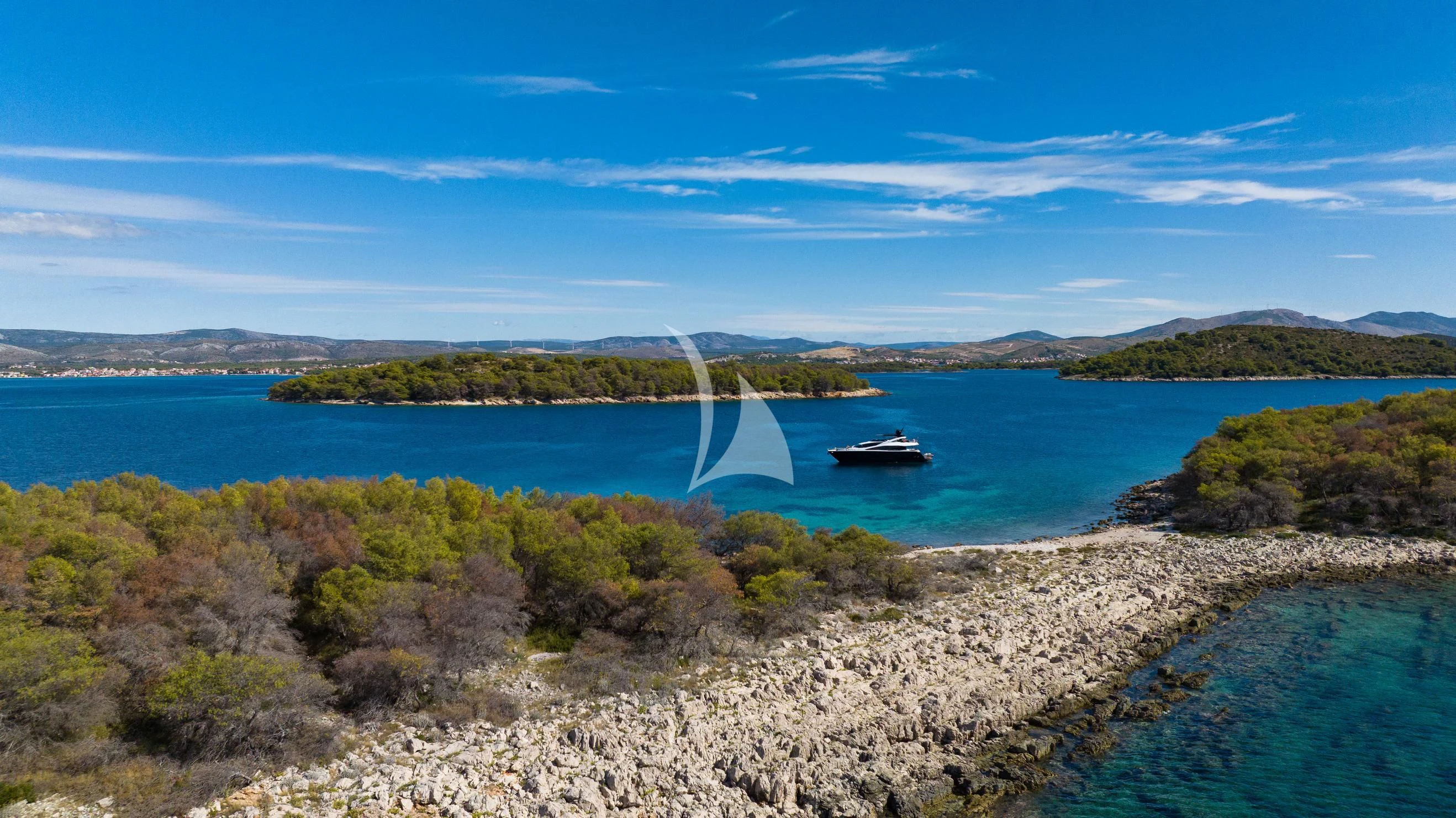 a boat on a body of water aboard BLACK MAMBA Yacht for Charter