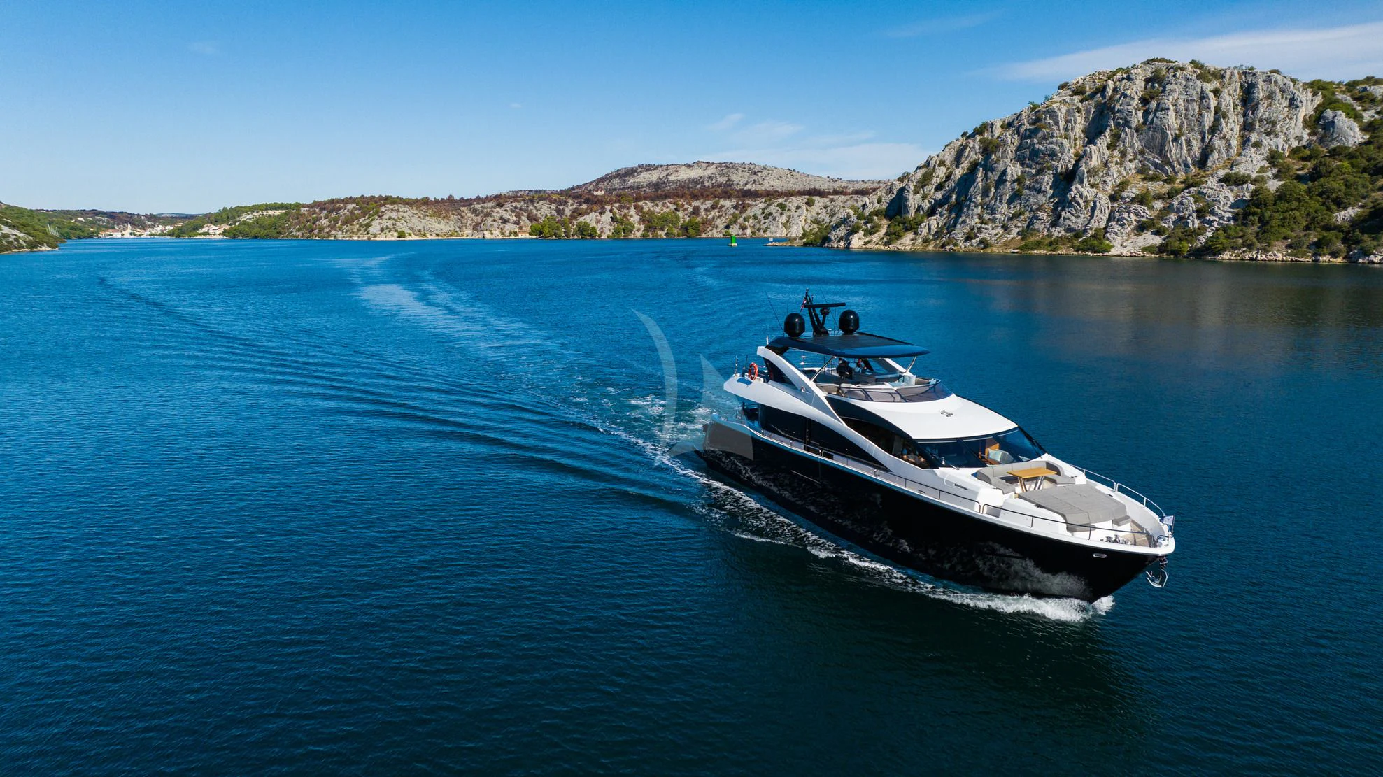 a boat on the water aboard BLACK MAMBA Yacht for Charter