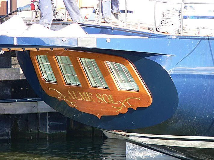 a boat with a blue and orange design aboard ALME SOL Yacht for Sale