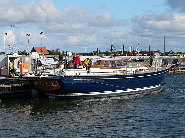 a boat is parked at a dock aboard ALME SOL Yacht for Sale