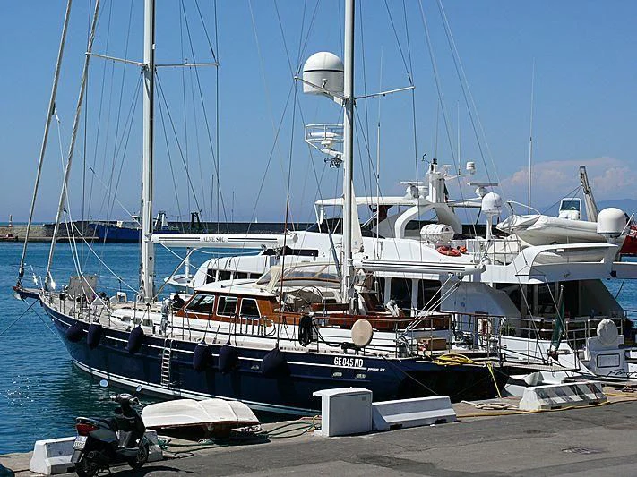 a boat docked at a pier aboard ALME SOL Yacht for Sale