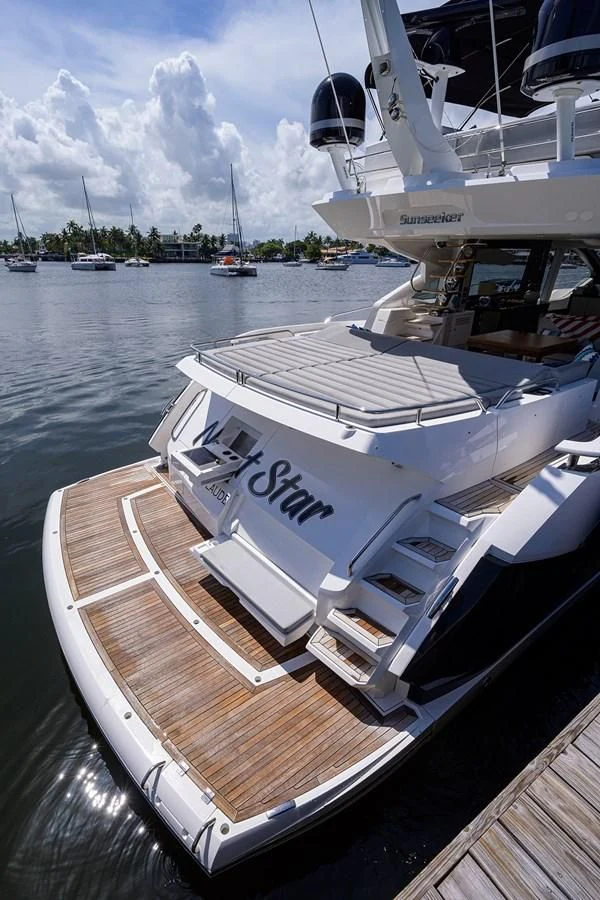 a boat docked at a pier aboard NIGHT STAR Yacht for Sale