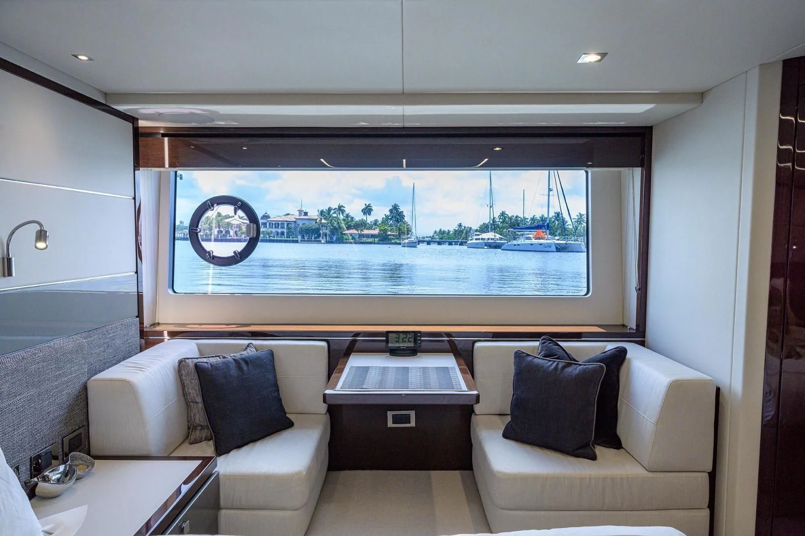 a room with a couch and a window aboard NIGHT STAR Yacht for Sale
