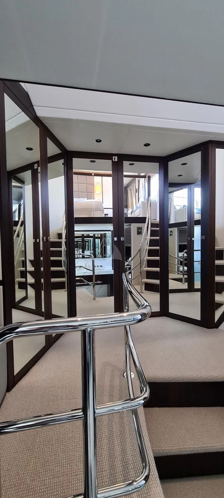 a train with metal railings aboard MR K IRISTON Yacht for Sale