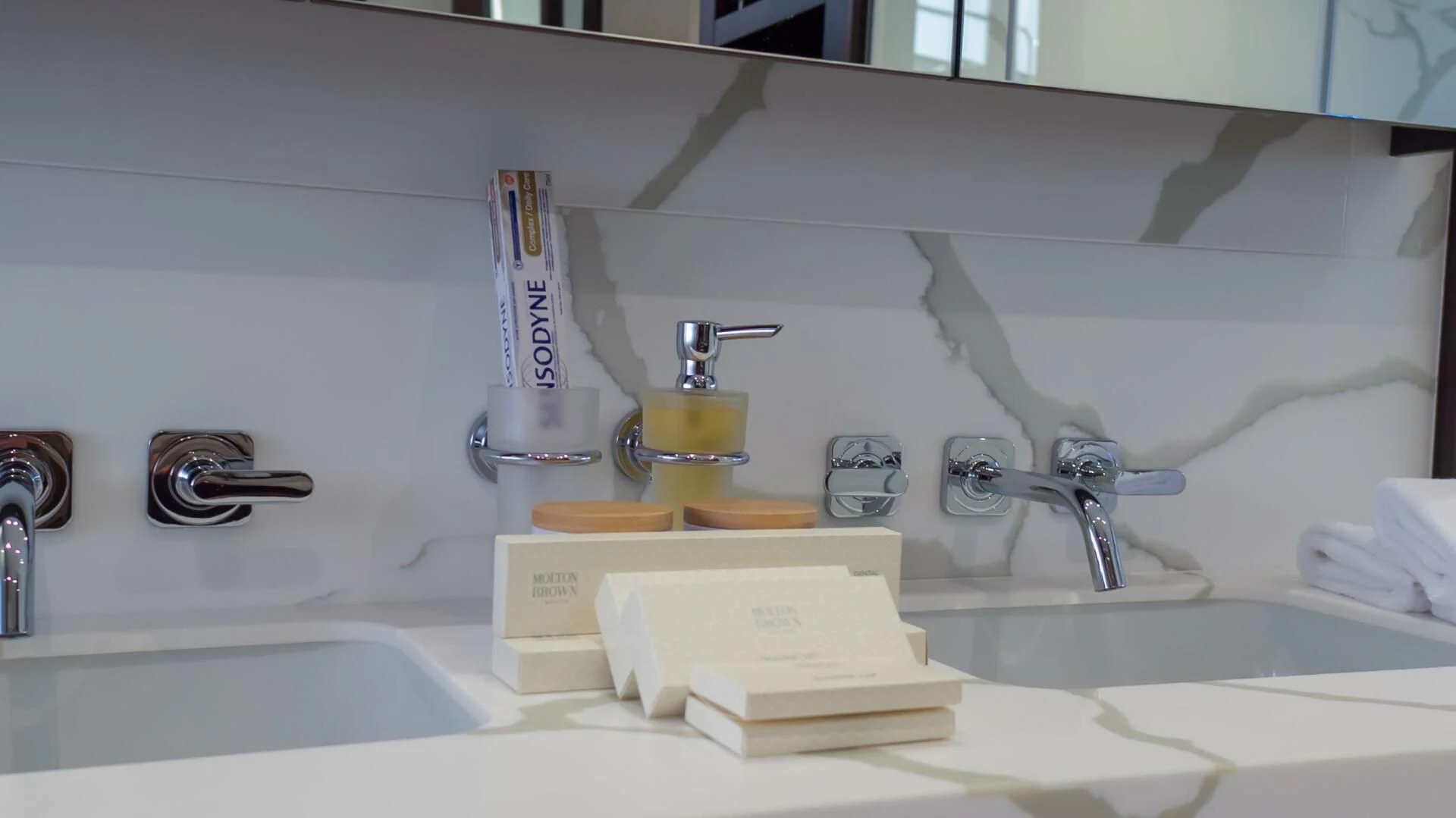 a sink with a faucet and a soap dispenser aboard MR K IRISTON Yacht for Sale