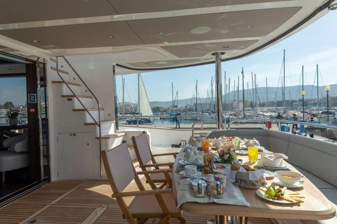 a table on a deck aboard MR K IRISTON Yacht for Sale