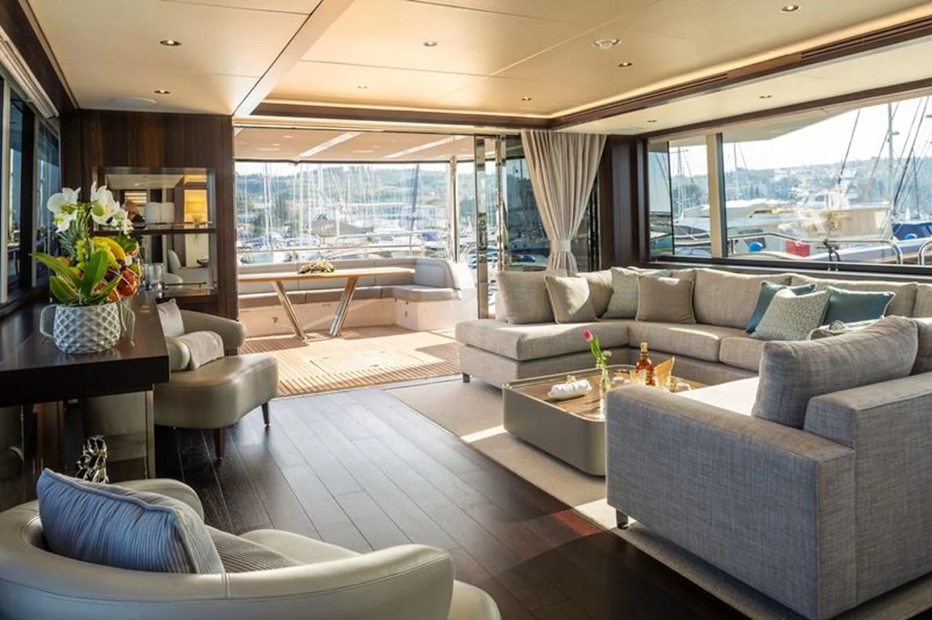 a living room with a large window aboard MR K IRISTON Yacht for Sale