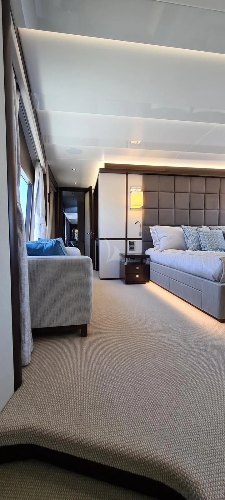 a room with a bed and a couch aboard MR K IRISTON Yacht for Sale