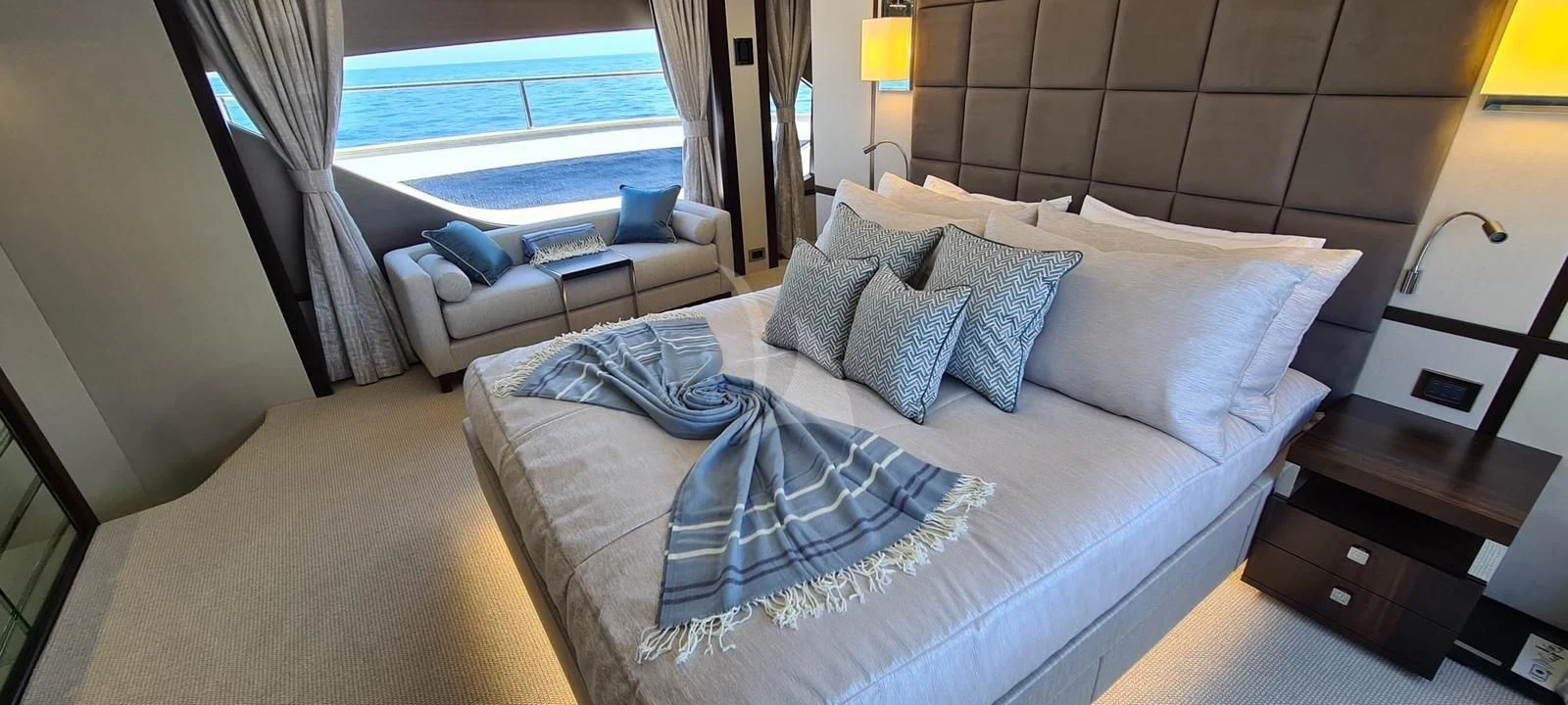 a bed with pillows and pillows aboard MR K IRISTON Yacht for Sale