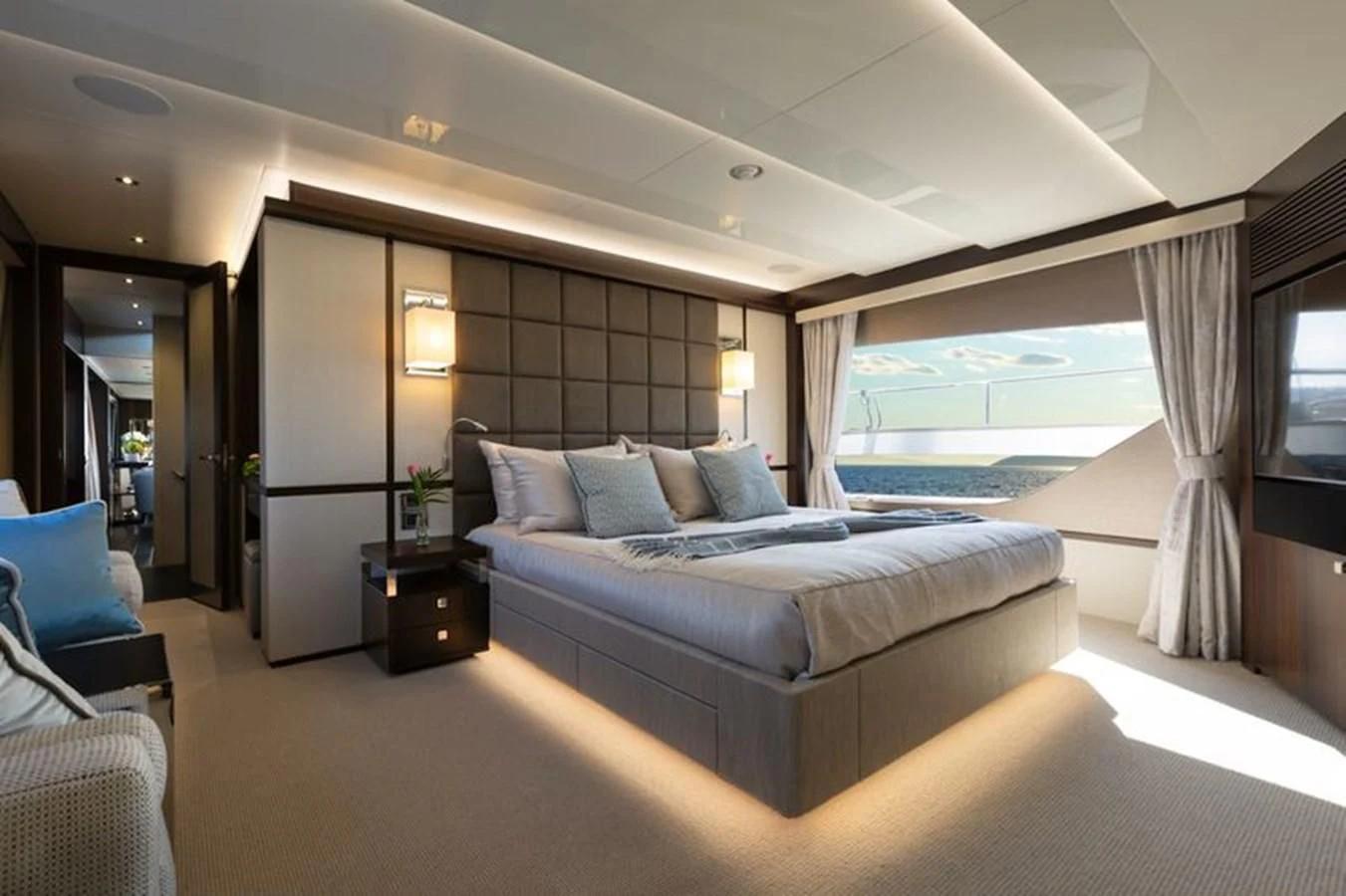 a large bed in a room aboard MR K IRISTON Yacht for Sale
