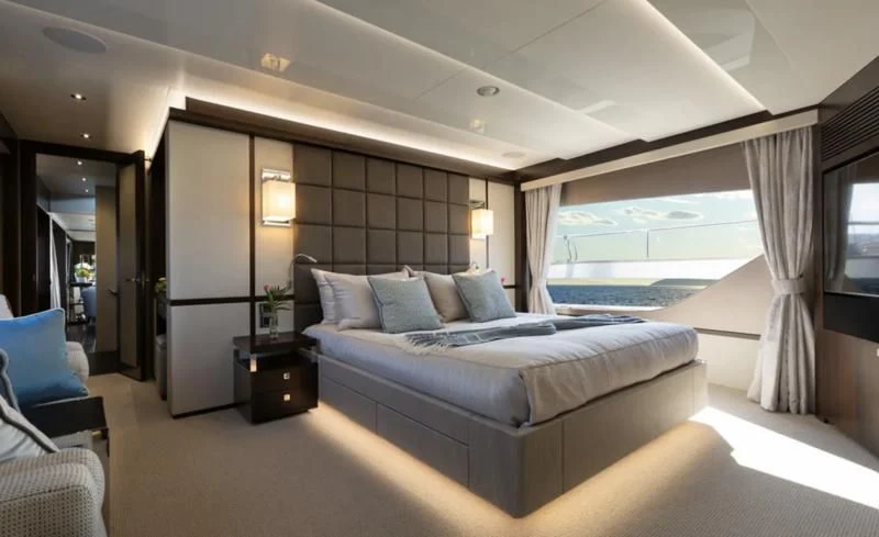 a large bed in a room aboard MR K IRISTON Yacht for Sale