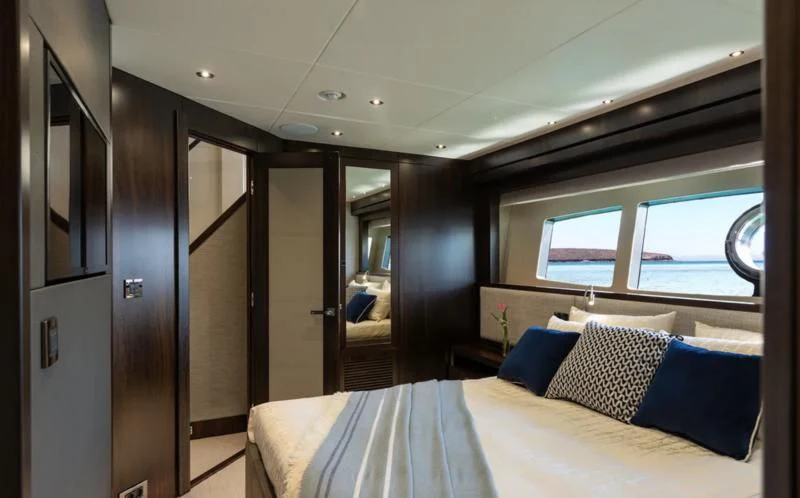 a bed in a room aboard MR K IRISTON Yacht for Sale