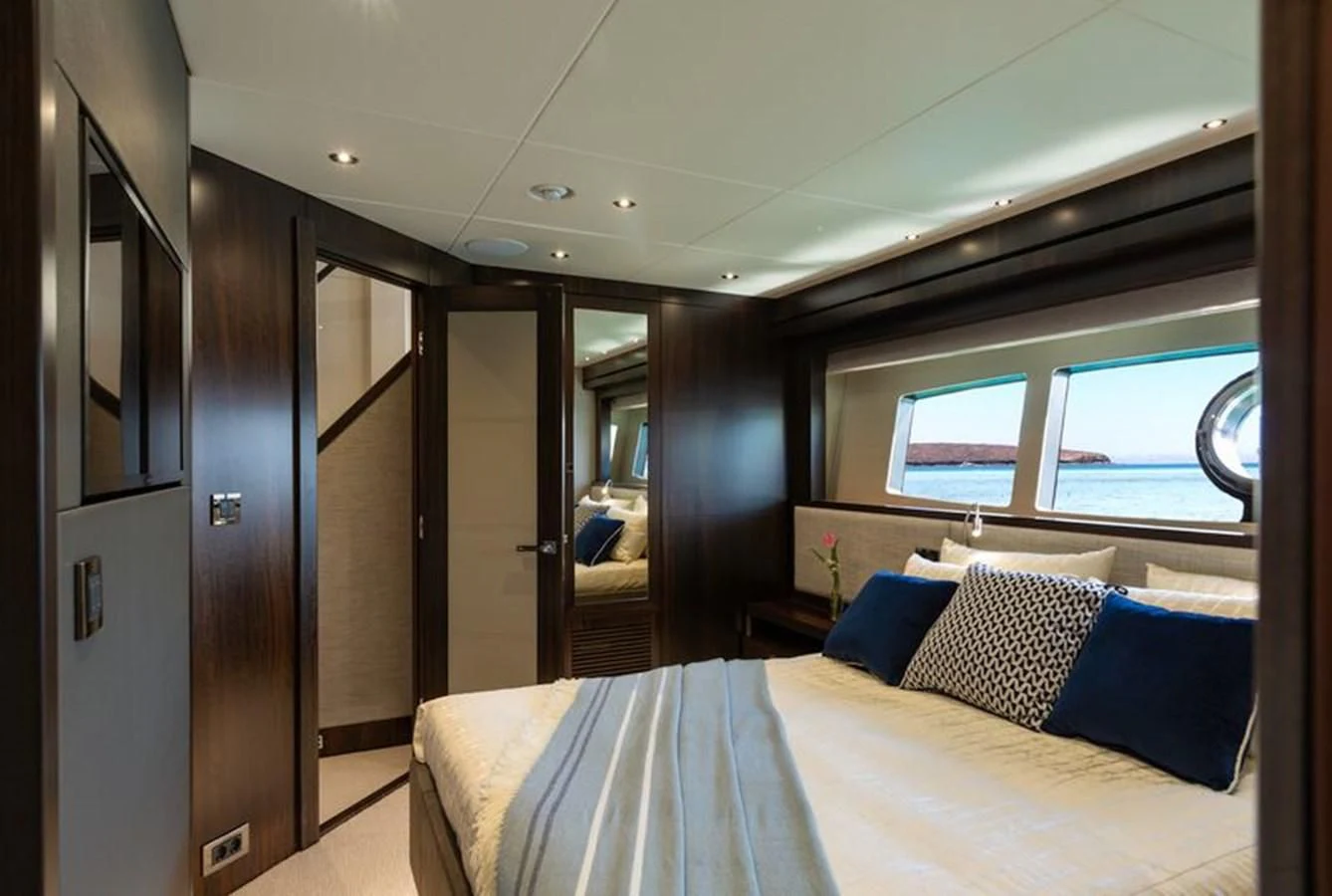 a bed in a room aboard MR K IRISTON Yacht for Sale