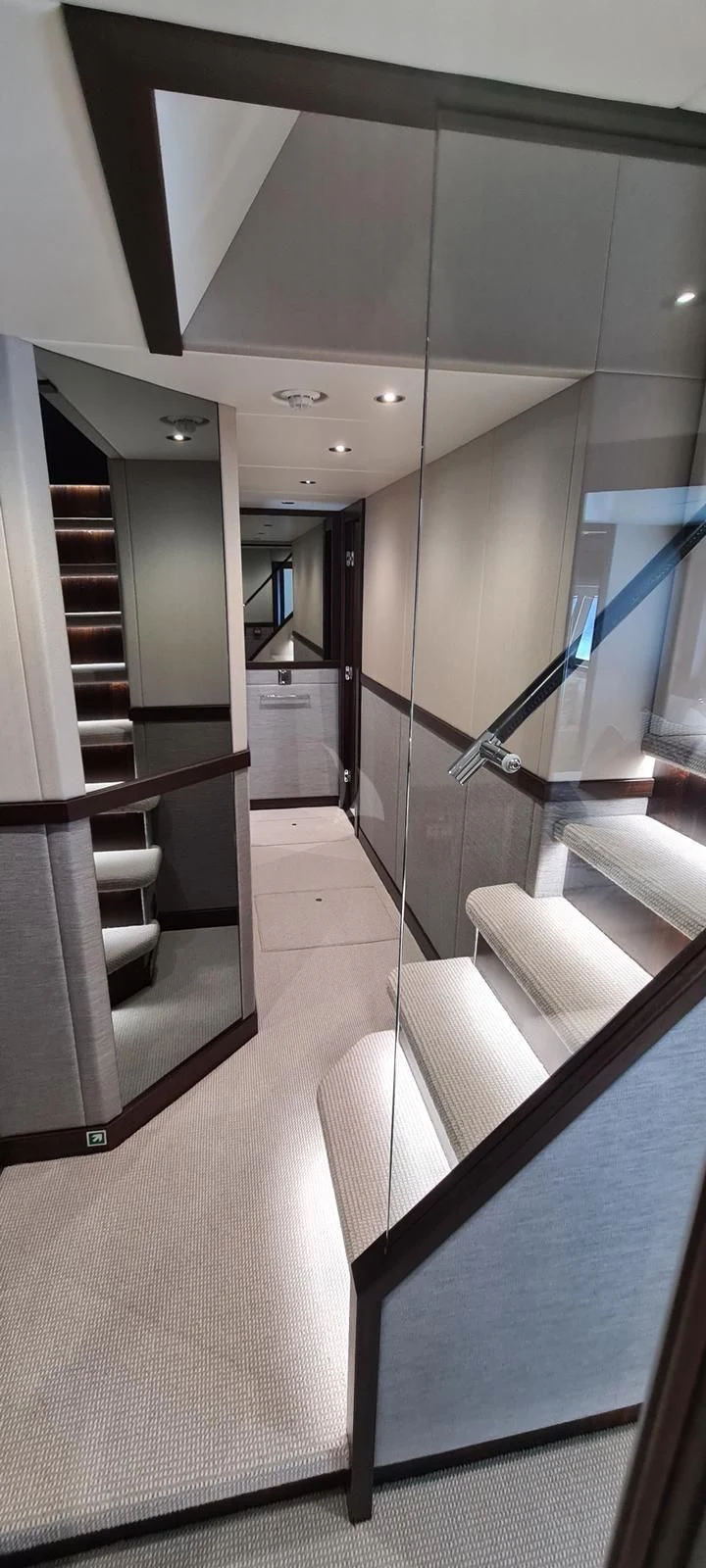 a room with a staircase and a glass door aboard MR K IRISTON Yacht for Sale