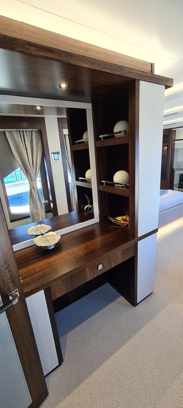 a wood shelf with a bowl of food on it aboard MR K IRISTON Yacht for Sale