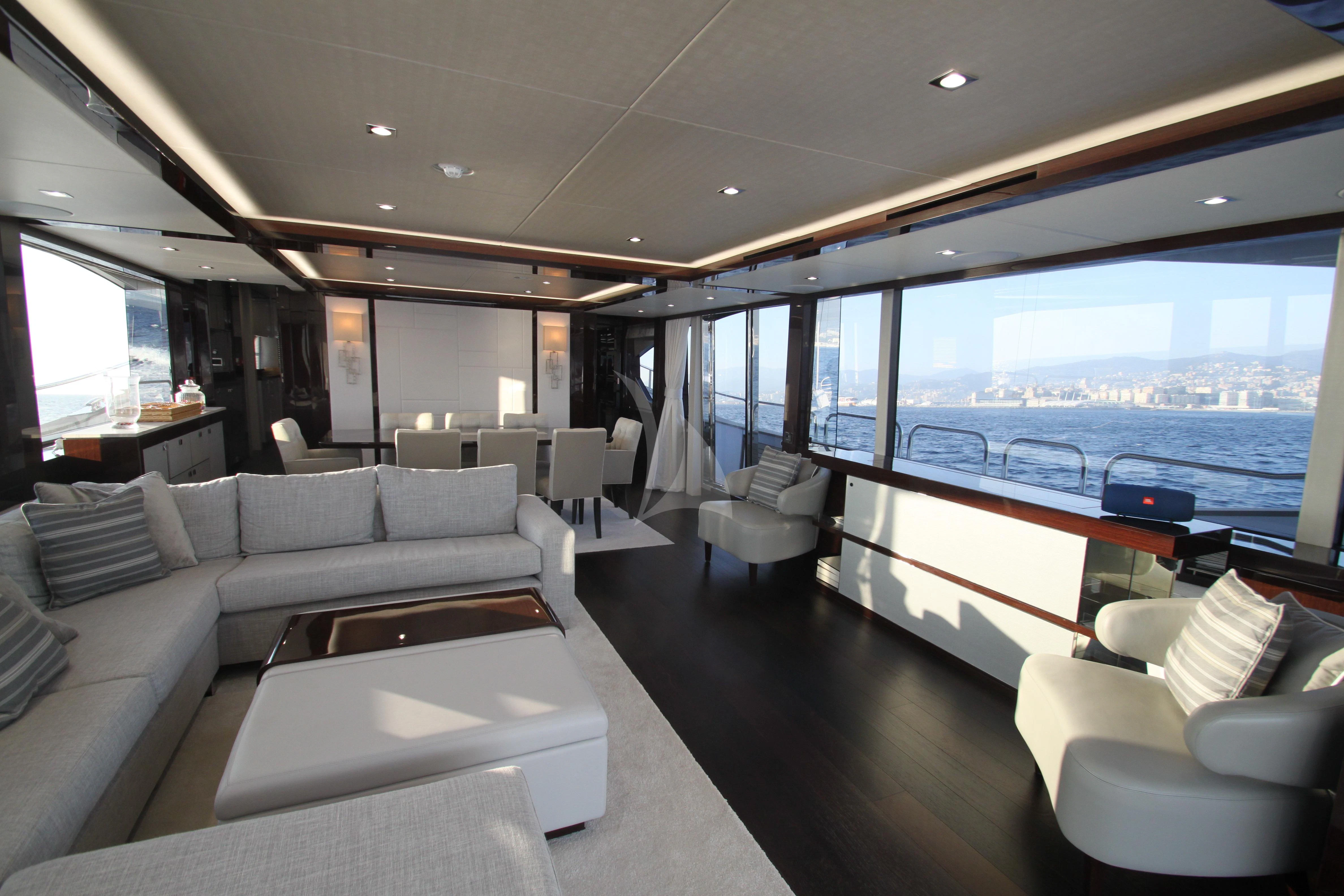a living room with a large window aboard MR K IRISTON Yacht for Sale