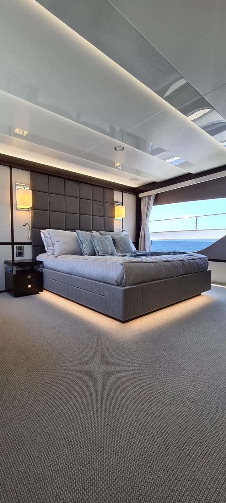a bed in a room aboard MR K IRISTON Yacht for Sale