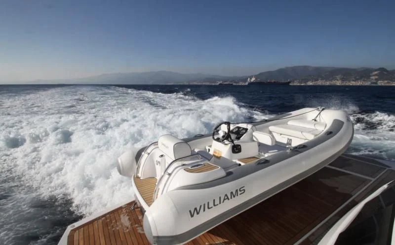 a speed boat on the water aboard MR K IRISTON Yacht for Sale