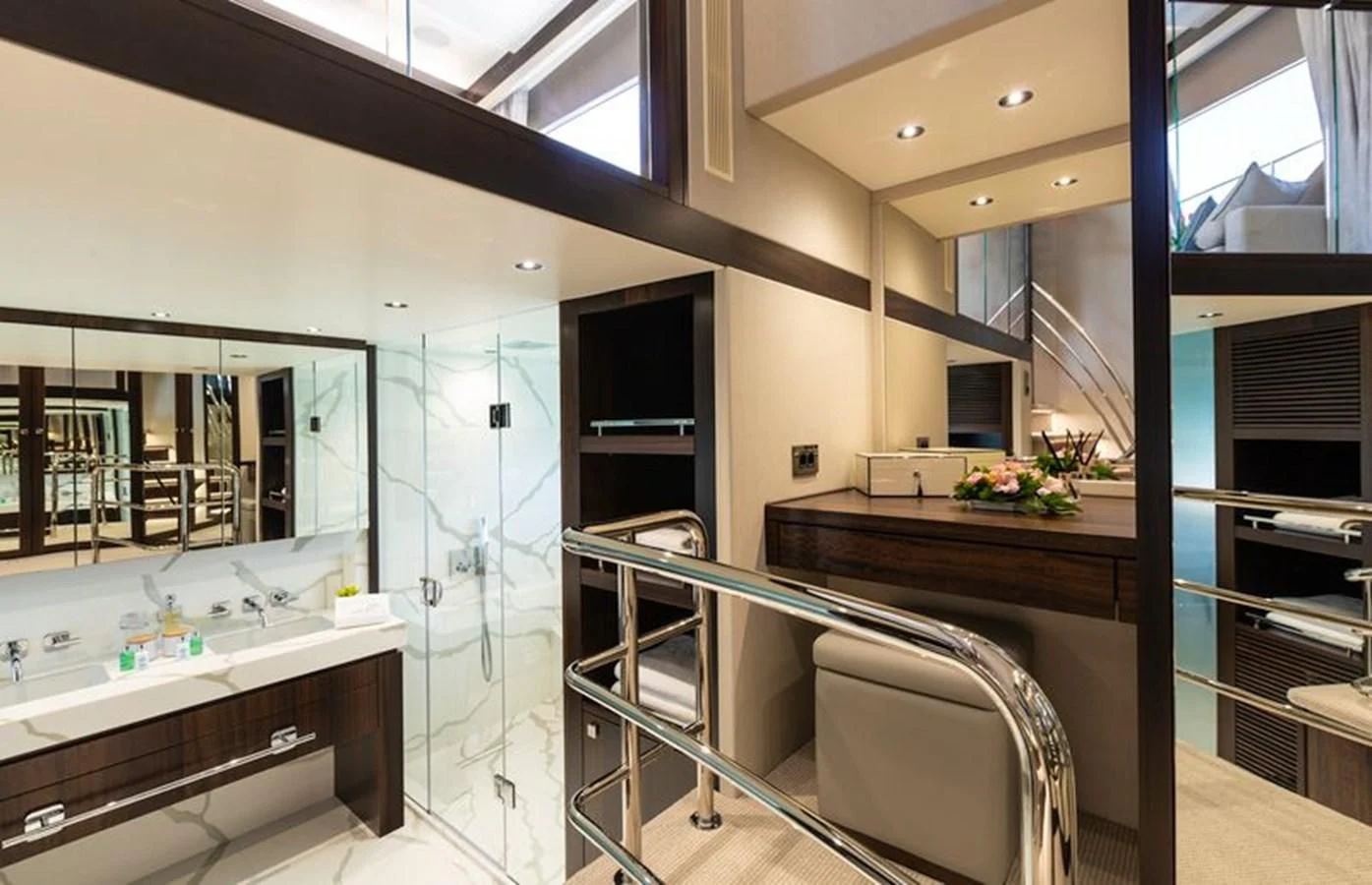 a modern bathroom with a glass shower aboard MR K IRISTON Yacht for Sale