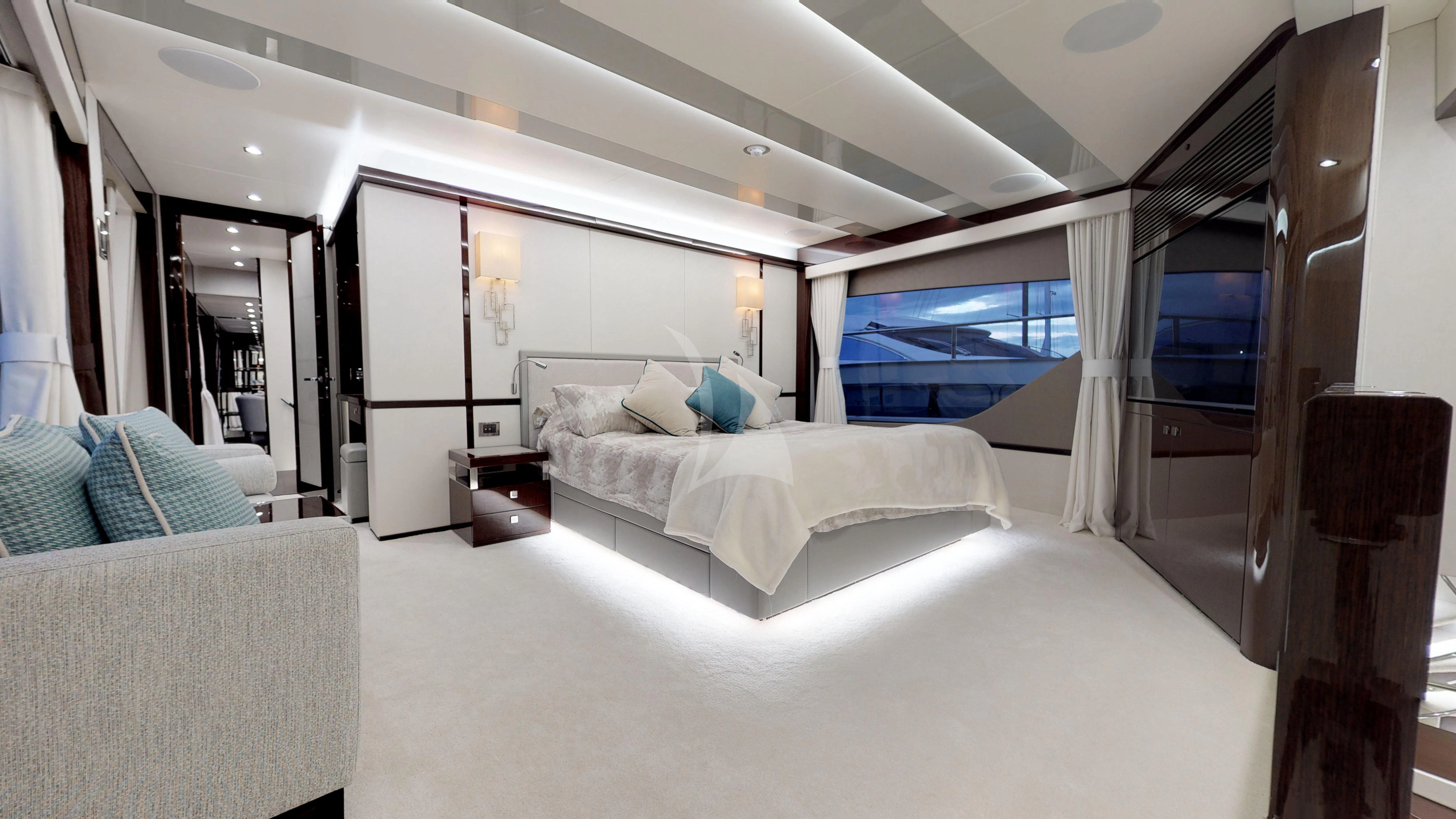 a large bedroom with a large bed aboard MR K IRISTON Yacht for Sale