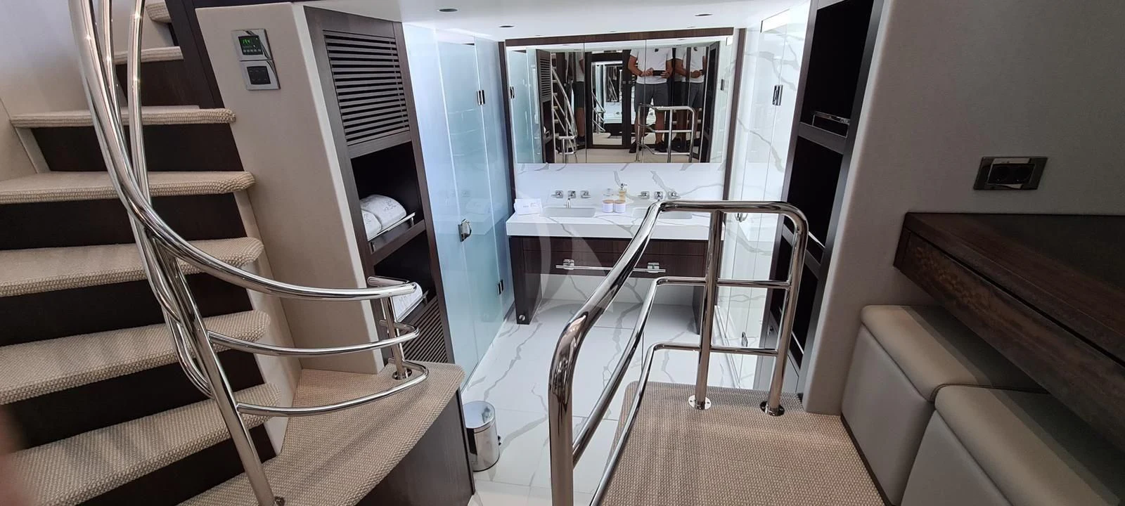 a room with a table and chairs aboard MR K IRISTON Yacht for Sale