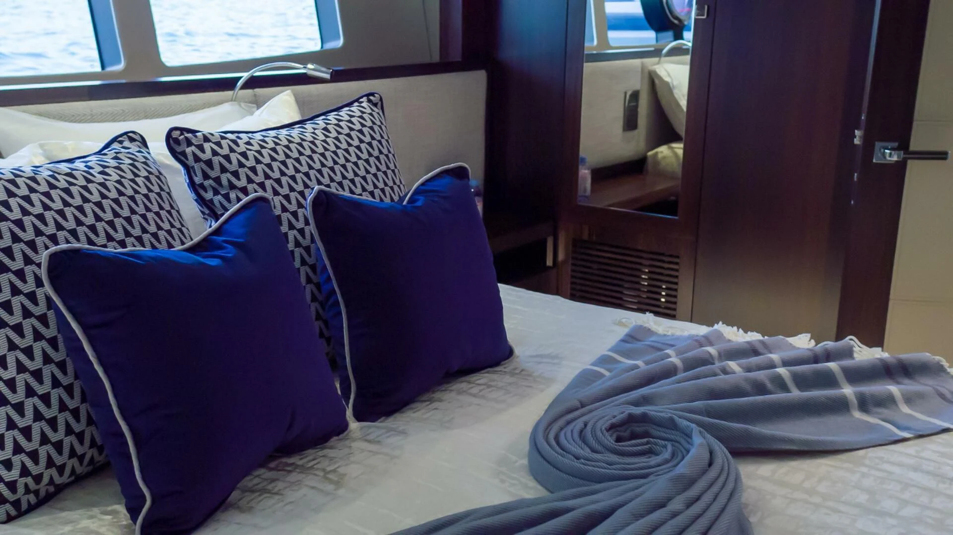 a bed with pillows aboard MR K IRISTON Yacht for Sale