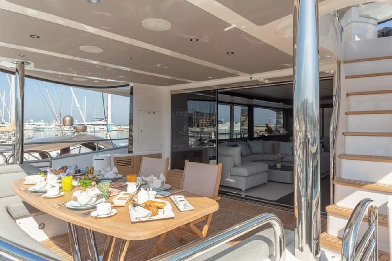 a large open living room with a large open window aboard MR K IRISTON Yacht for Sale