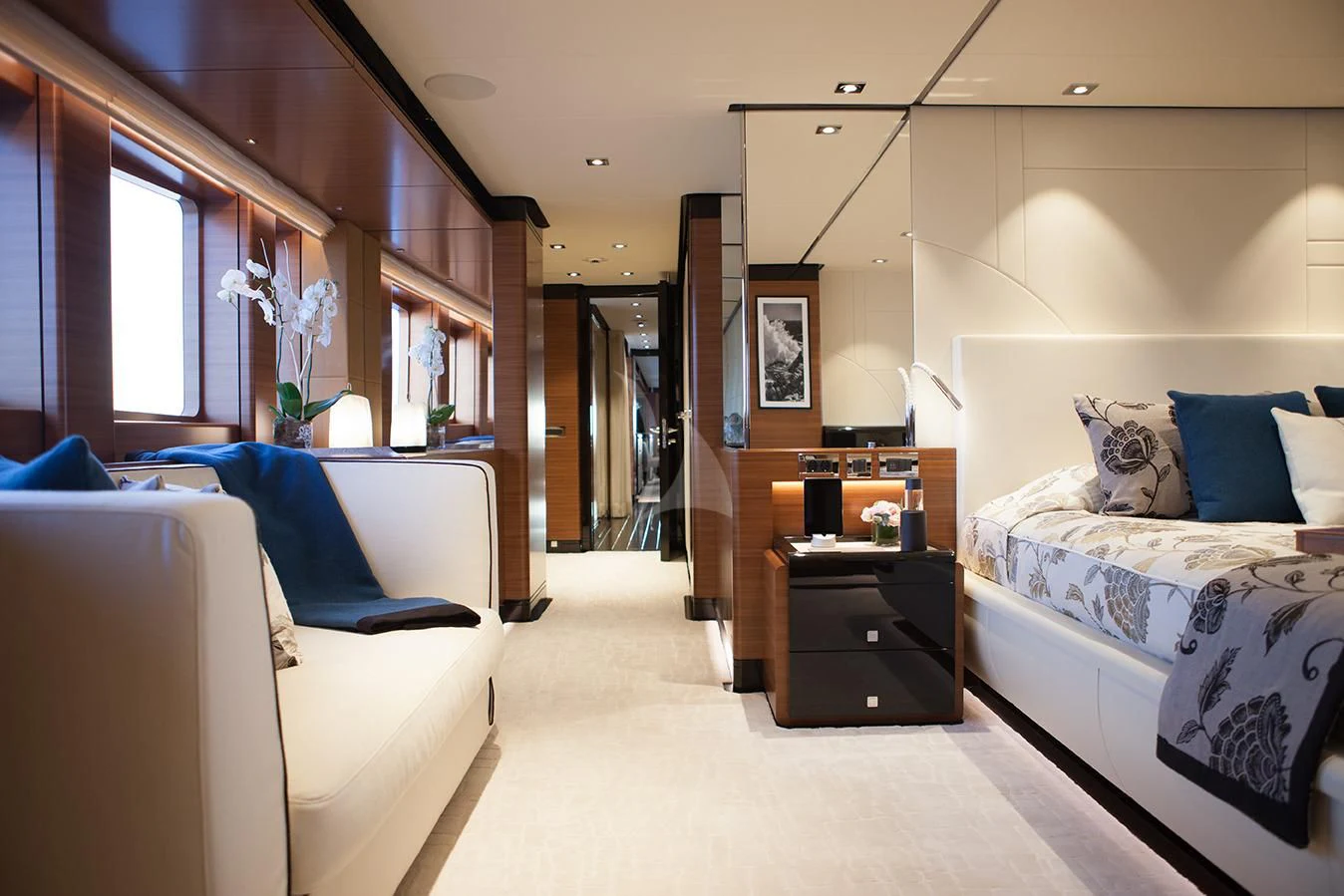 a room with a bed and a desk aboard DAISY D Yacht for Sale