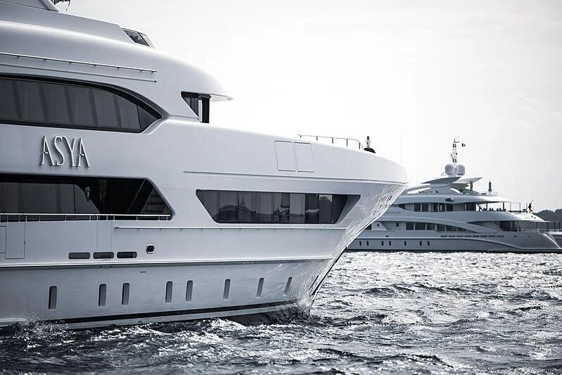 a couple of large white yachts aboard DAISY D Yacht for Sale