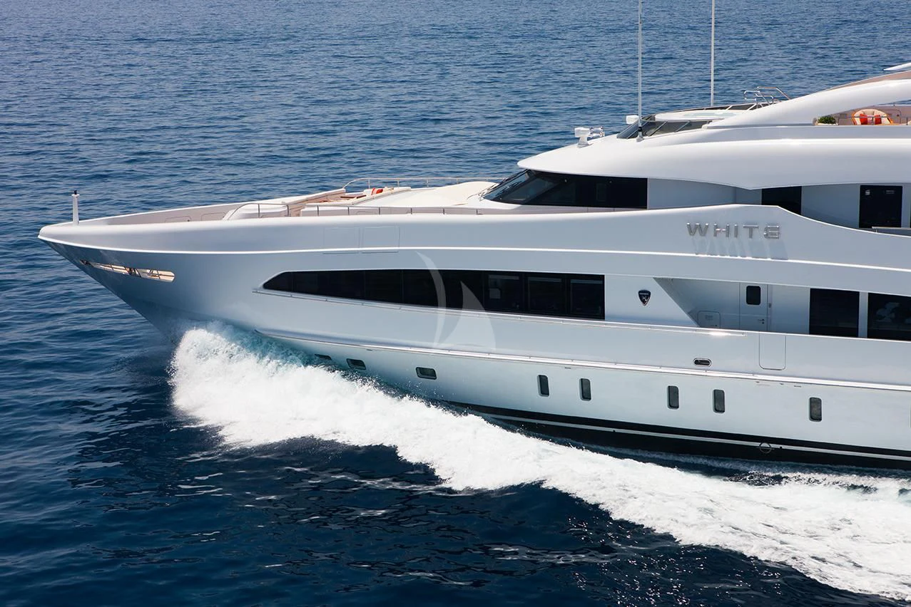a white yacht in the water aboard DAISY D Yacht for Sale
