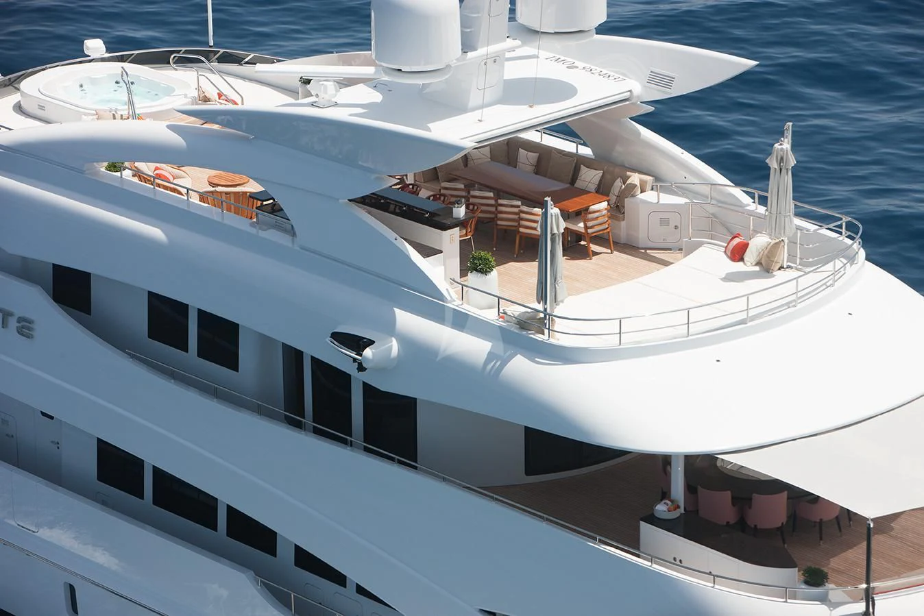 a white boat with a deck aboard DAISY D Yacht for Sale