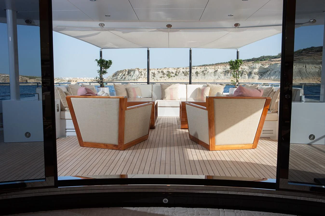 a room with a large window aboard DAISY D Yacht for Sale