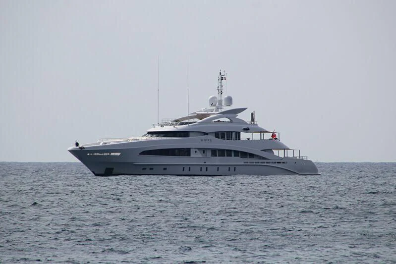 a large white yacht in the water aboard DAISY D Yacht for Sale