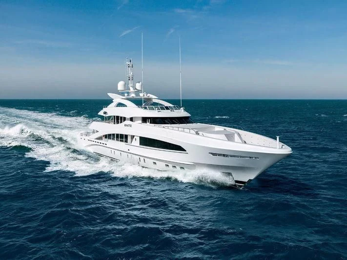 a white yacht in the water aboard DAISY D Yacht for Sale