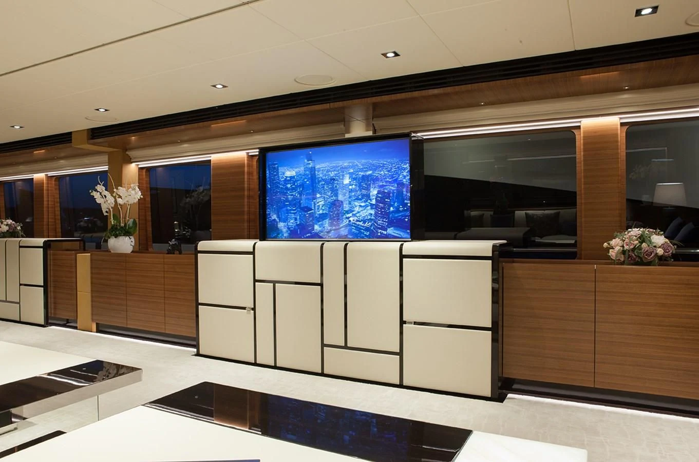 a room with a large glass wall aboard DAISY D Yacht for Sale