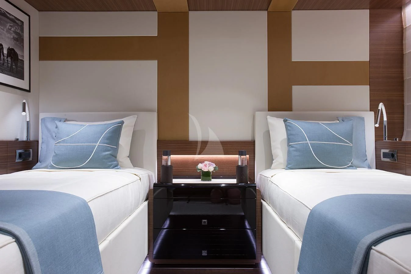a room with a bed and a table aboard DAISY D Yacht for Sale