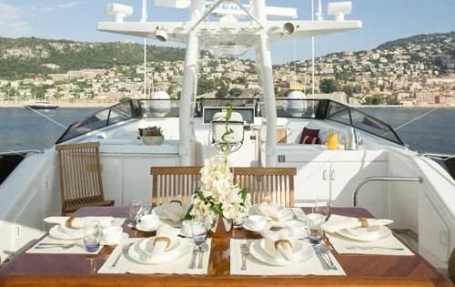 a table set for a dinner aboard ATLANTIC ENDEAVOUR Yacht for Charter