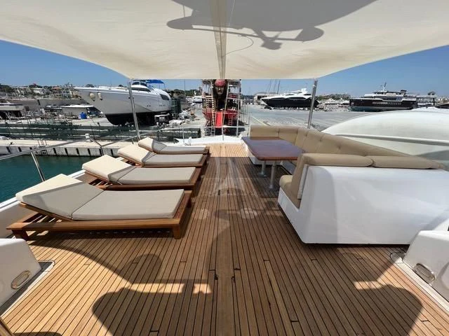 a deck with a view of a city and boats on it aboard ATLANTIC ENDEAVOUR Yacht for Charter