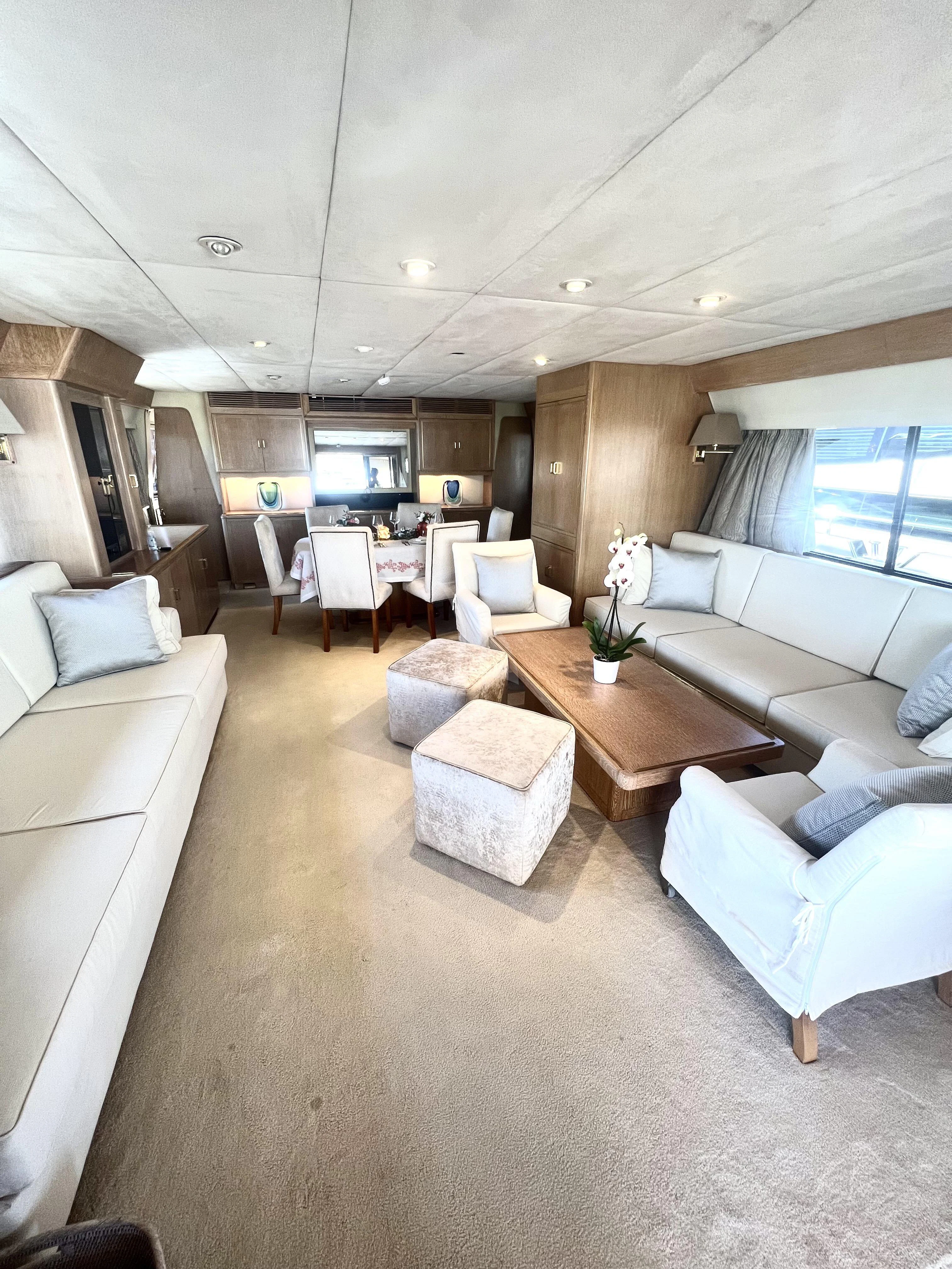a living room with a couch and a table aboard ATLANTIC ENDEAVOUR Yacht for Charter