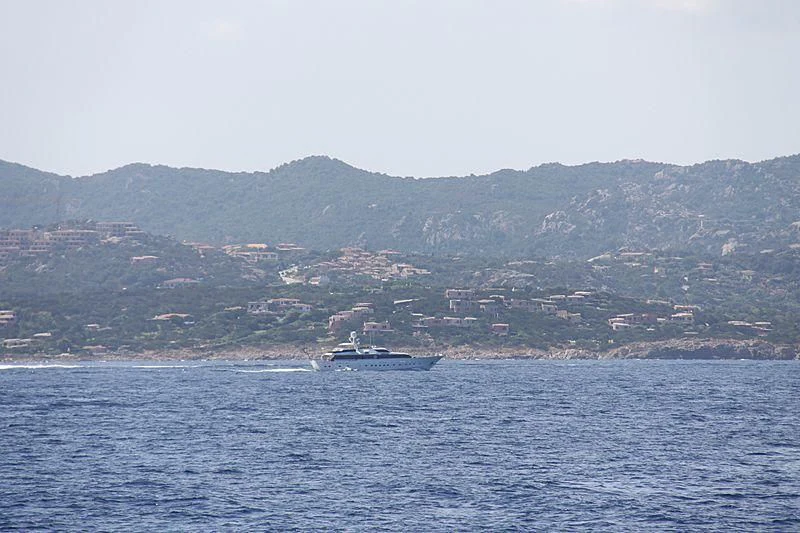 a large body of water with a town in the distance aboard ATLANTIC ENDEAVOUR Yacht for Charter