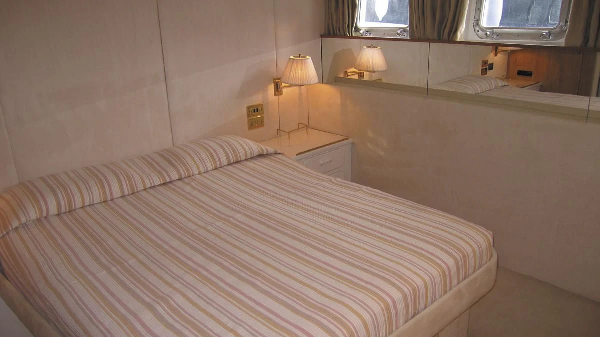 a couple of beds in a room aboard ATLANTIC ENDEAVOUR Yacht for Charter